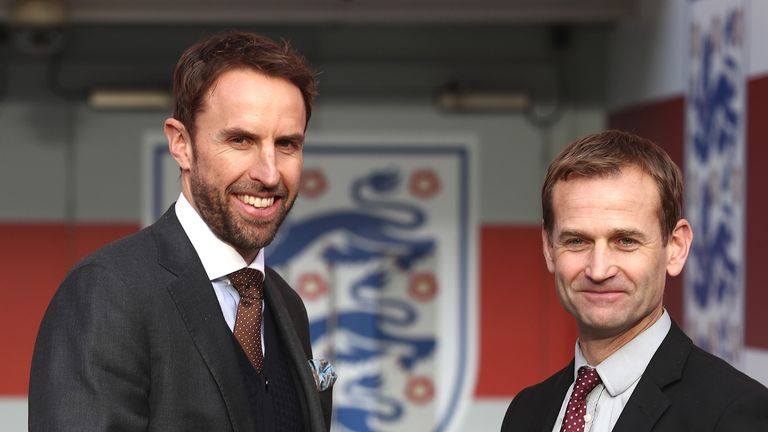 FA Technical Director Dan Ashworth (R) shakes hands with Gareth Southgate in front of the tunnel as he is unveiled as the new England manager at Wembley Stadium on December 1, 2016 in London, England.