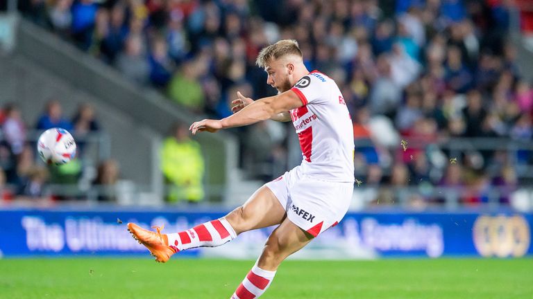 St Helens' Danny Richardson kicks a drop goal 