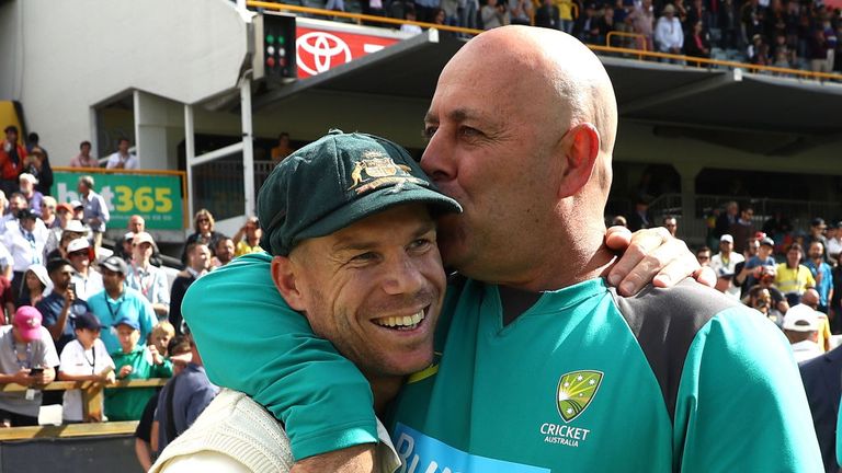  David Warner of Australia and Australian Head Coach Darren Lehmann celebrate after Australian claimed victory during day five of the Third Test match during the 2017/18 Ashes Series between Australia and England at WACA on December 18, 2017 in Perth, Australia.