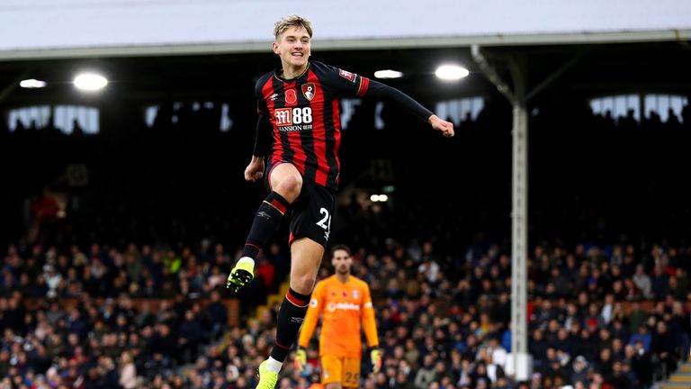 David Brooks celebrates after doubling Bournemouth's lead at Craven Cottage