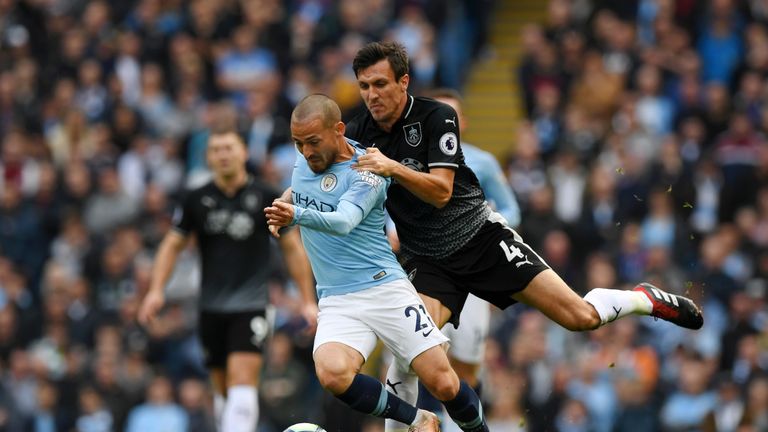 David Silva is challenged by Jack Cork