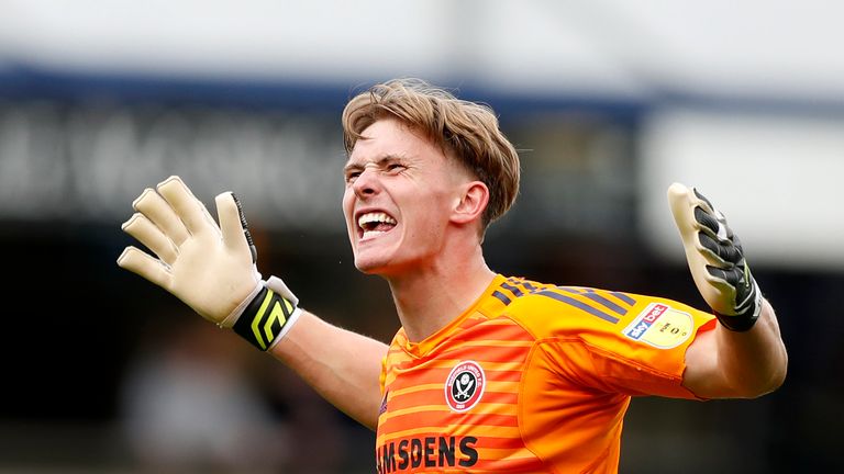 Dean Henderson celebrates Sheffield United's victory over QPR