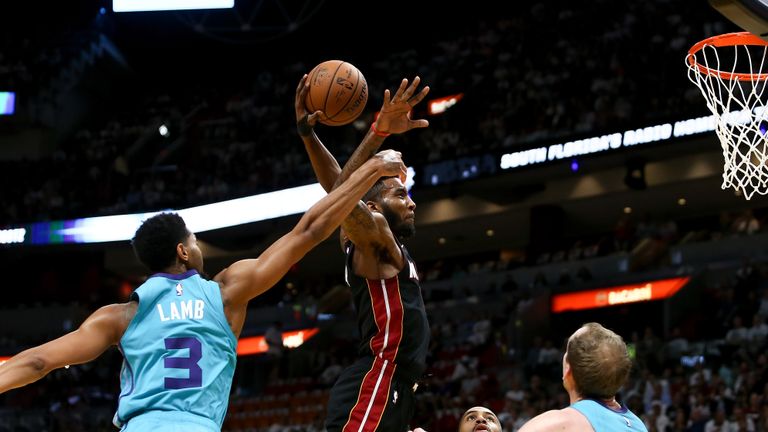 OCTOBER 20: Derrick Jones Jr. #5 of the Miami Heat goes up for a dunk against the Charlotte Hornets during the first half at American Airlines Arena on October 20, 2018 in Miami, Florida.