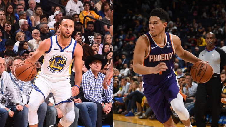 devin booker and stephen curry in their match suns v warriors