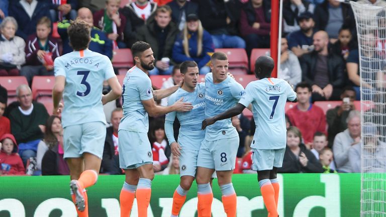 Eden Hazard celebrates with team-mates after giving Chelsea a 1-0 lead