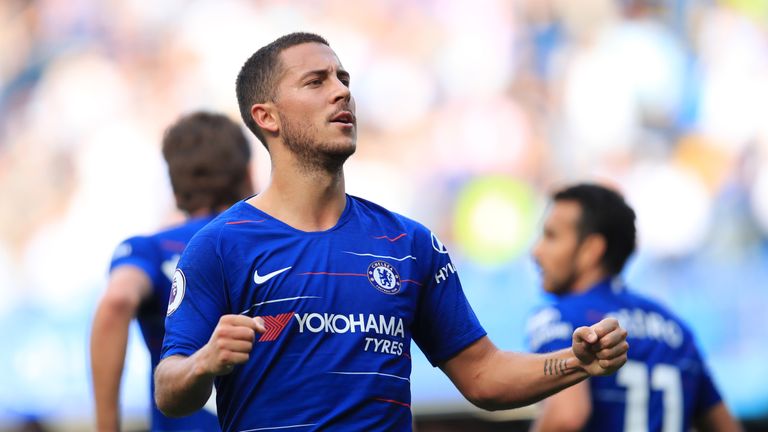 Eden Hazard celebrates after scoring Chelsea&#39;s first goal during the Premier League match against Cardiff City at Stamford Bridge on September 15, 2018