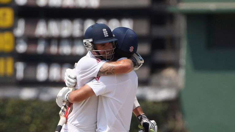 Kevin Pietersen hugs England team-mate Alastair Cook  after scoring the winning runs in the second Test