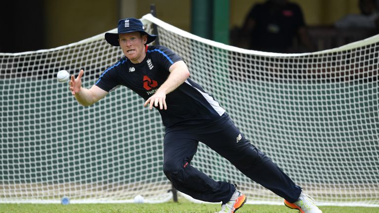 England captain Eoin Morgan dives for a catch during fielding practice in Sri Lanka