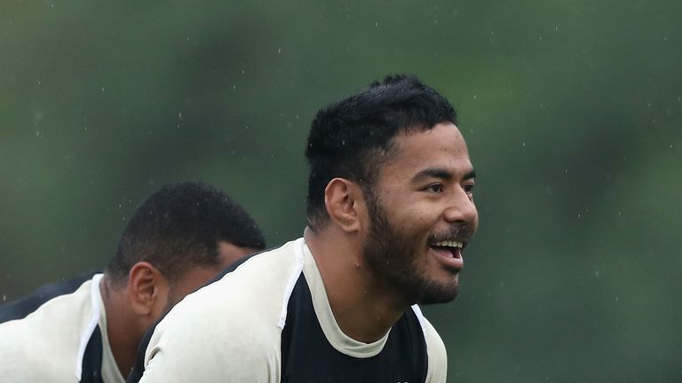 England&#39;s Manu Tuilagi is all-smiles during a training session in Vilamoura, Portugal.