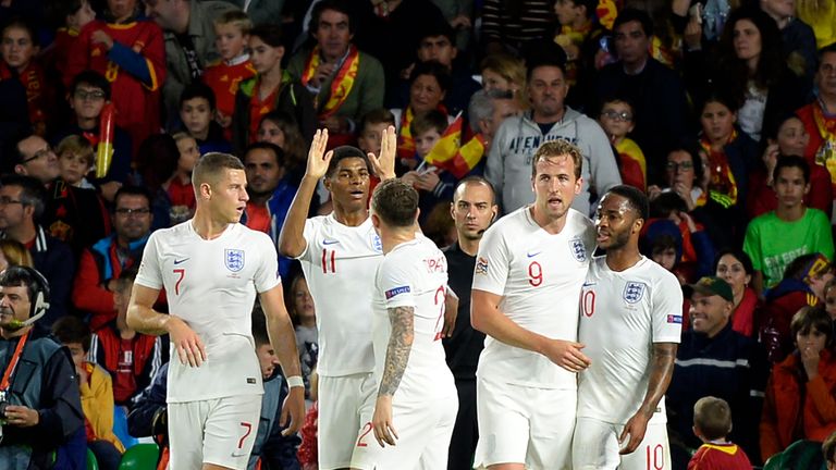 England players celebrate Marcus Rashford's strike