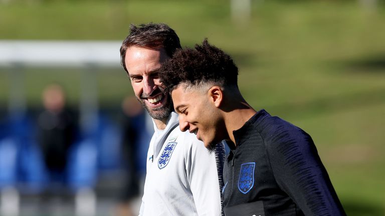 England manager Gareth Southgate with Jadon Sancho during training at St George's Park