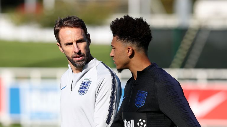 England manager Gareth Southgate with Jadon Sancho during training at St George's Park