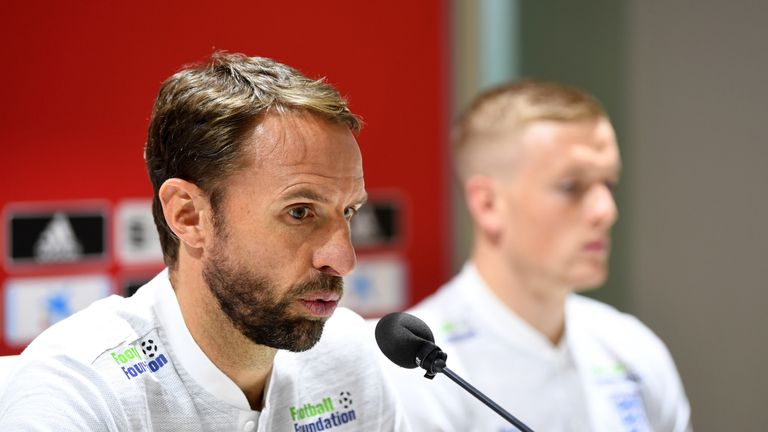 Gareth Southgate, Manager of England and Jordan Pickford of England attend an England press conference ahead of their UEFA Nations League match against Spain at Estadio Benito Villamarin on October 14, 2018 in Seville, Spain
