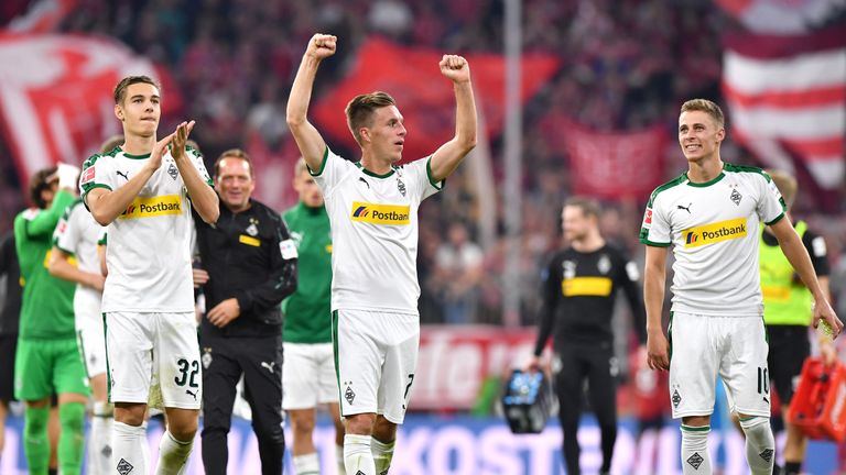 The Gladbach players celebrate at the full-time whistle at the Allianz Arena