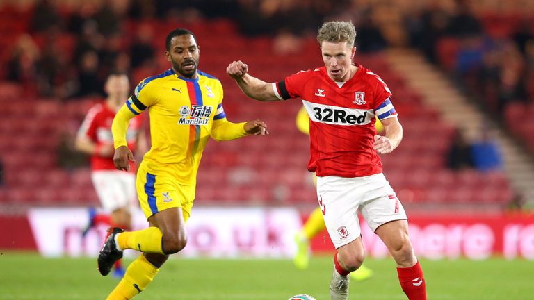 Grant Leadbitter of Middlesbrough battles for possession with Jason Puncheon of Crystal Palace during the Carabao Cup Fourth Round match between Middlesbrough and Crystal Palace at Riverside Stadium on October 31, 2018 in Middlesbrough, England