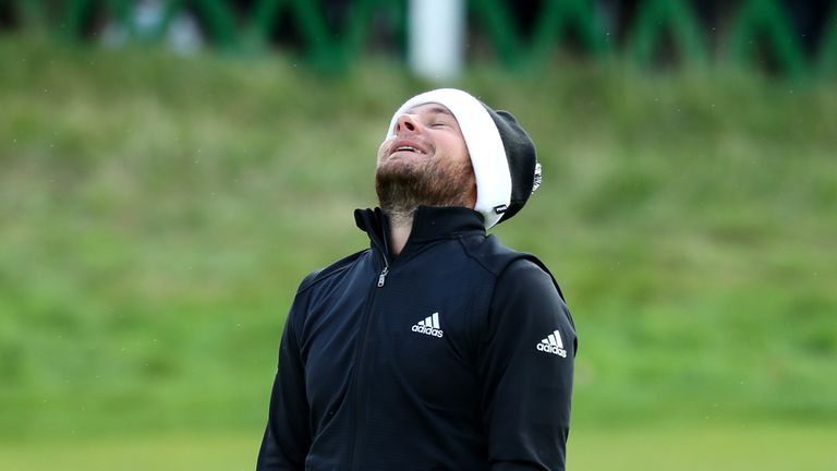 Tyrrell Hatton reacts after his missed birdie putt at the 18th to force a play-off
