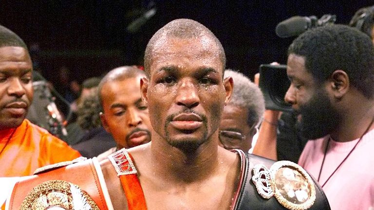  Bernard Hopkins of the US wears his three belts after defeating WBA Champion Felix Trinidad of Puerto Rico in their 12-round unification bout at Madison Square Gardens in New York 29 September, 2001. Hopkins won by a technical knockout in the 12th round to secure the undisputed Middleweight Championship. AFP PHOTO  Timothy A. Clary (Photo credit should read TIMOTHY A. CLARY/AFP/Getty Images)