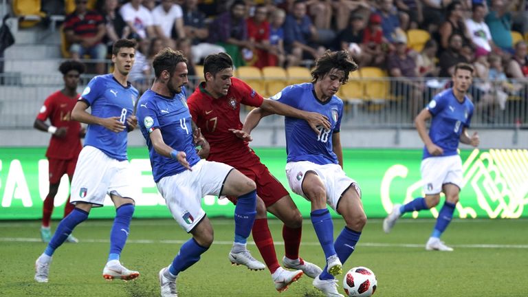 Italy's Gianmaria Zanandrea (L) and Sandro Tonali (R) vie for the ball with Portugal's Joao Filipe (C) during the 2018 UEFA European Under 19 Championship FIFA final football match between Italy vs Portugal in Seinajoki, Finland, on July 29, 2018. (Photo by Timo Aalto / Lehtikuva / AFP) / Finland OUT (Photo credit should read TIMO AALTO/AFP/Getty Images)