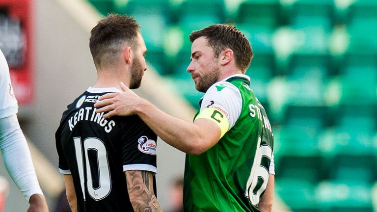 Hamilton's James Keatings is consoled by former team mate Lewis Stevenson after their 6-0 defeat to Hibernian