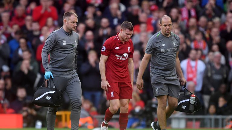 James Milner leaves the pitch after picking up an injury