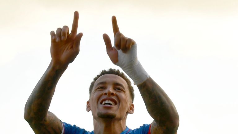 Rangers captain James Tavernier celebrates after scoring their second penalty