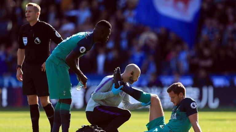 Tottenham Hotspur's Jan Vertonghen receives treatment for an injury during the Premier League match at the John Smith's Stadium, Huddersfield