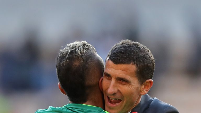 Javi Gracia hugs Roberto Pereyra after Watford's win at Wolves