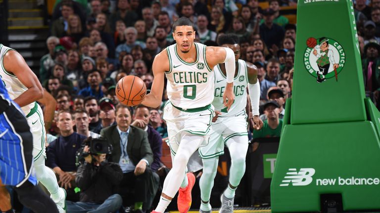 Jayson Tatum of the Boston Celtics handles the ball against the Orlando Magic 
