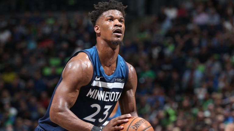Jimmy Butler #23 of the Minnesota Timberwolves shoots a free throw against the Houston Rockets 