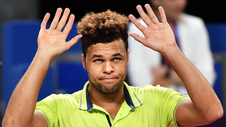 France's Jo-Wilfried Tsonga reacts as he withdraws against France's Lucas Pouille during their semi final tennis match at the Open Sud de France ATP World Tour in Montpellier, southern France, on February 10, 2018.