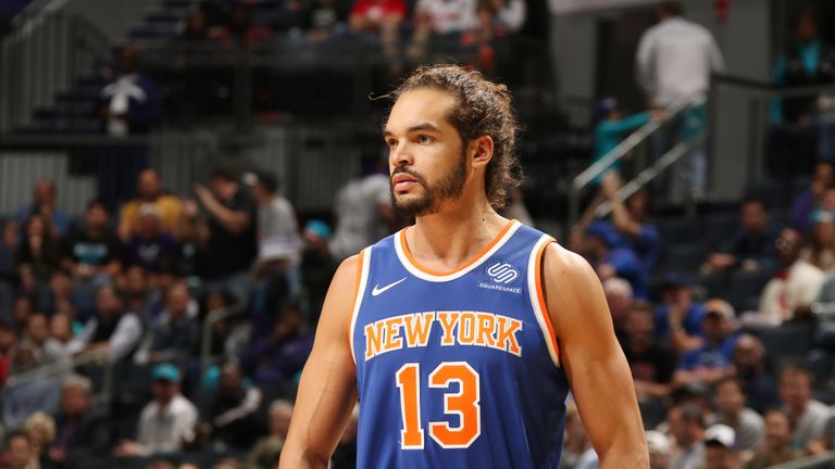 Joakim Noah #13 of the New York Knicks looks on during the NBA game against the Charlotte Hornets on December 18, 2017 at Spectrum Center in Charlotte, North Carolina