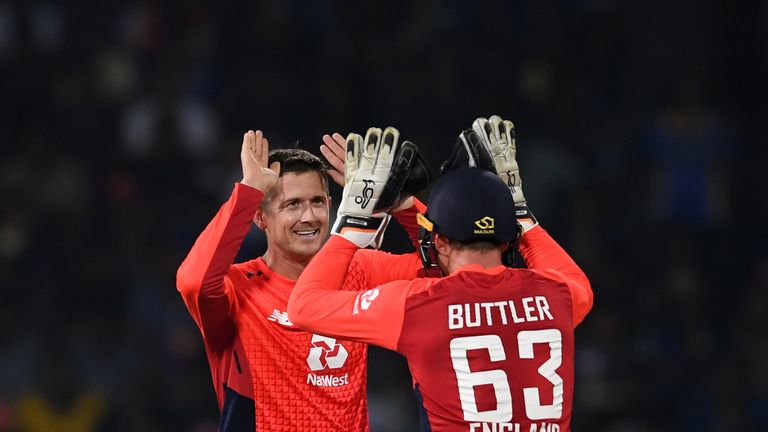 Joe Denly celebrates a wicket with Jos Buttler