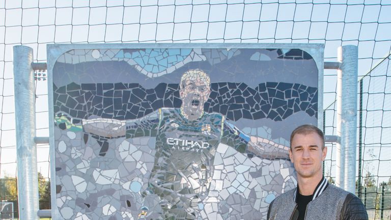 Joe Hart poses with commemorative plaque at Joe Hart training pitch (Pic courtesy of Manchester City)