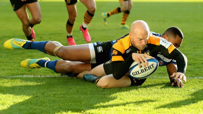 Joe Simpson of Wasps dives over for a second half try during the Champions Cup match between Wasps and Bath Rugby at Ricoh Arena on October 20, 2018 in Coventry, United Kingdom.