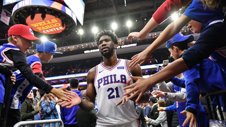 Joel Embiid #21 of the Philadelphia 76ers exits the floor after defeating the Orlando Magic on October 20, 2018 in Philadelphia, Pennsylvania 