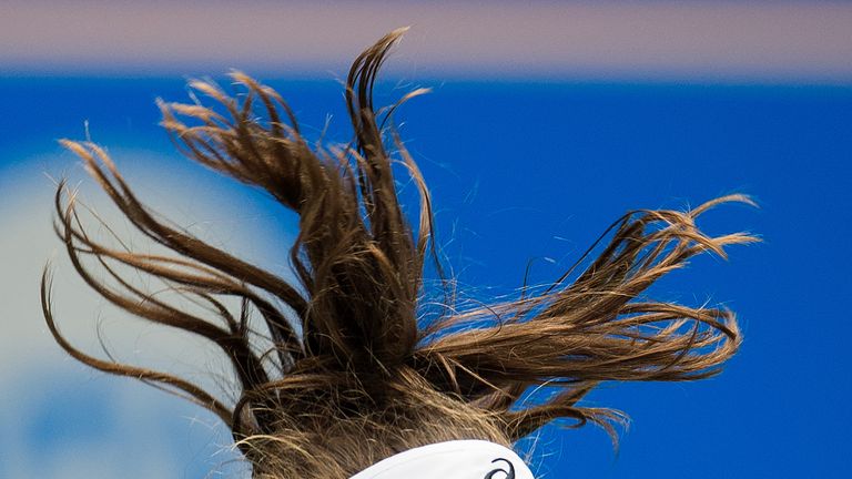 Johanna Konta of Britain serves against Ashleigh Barty of Australia during their women's singles second round match of the WTA Wuhan Open tennis tournament in Wuhan on September 24, 2018.
