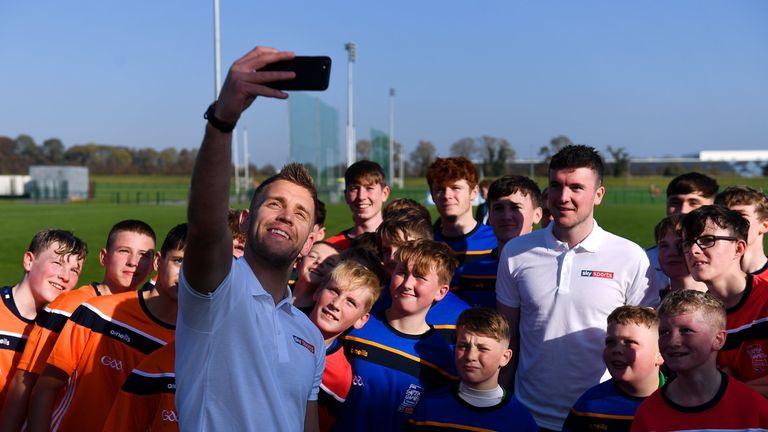 Dublin footballer Jonny Cooper and Limerick hurler Declan Hannon with participants at the GAA Super Games Centre National Blitz Day in partnership with Sky Sports at the GAA Games Development Centre in Abbotstown, Dublin.