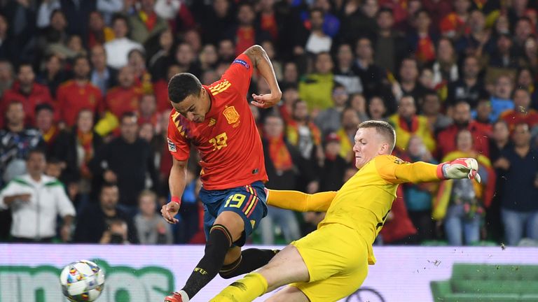 Jordan Pickford tackles Rodrigo after being dispossessed in his own area
