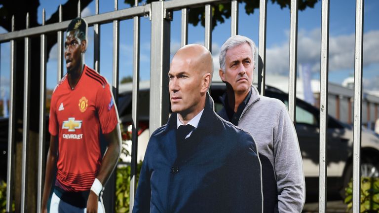 Zinedine Zidane's cut-out placed in-front of Jose Mourinho's