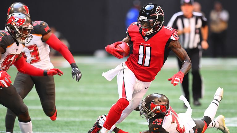 ATLANTA, GA - OCTOBER 14: Julio Jones #11 of the Atlanta Falcons is tackled by Ryan Smith #29 of the Tampa Bay Buccaneers during the first quarter against the Tampa Bay Buccaneers at Mercedes-Benz Stadium on October 14, 2018 in Atlanta, Georgia. (Photo by Scott Cunningham/Getty Images)