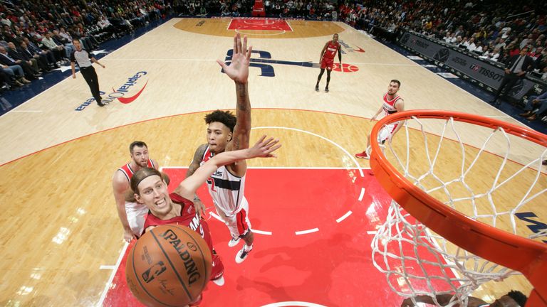 Kelly Olynyk #9 of the Miami Heat goes to the basket against the Washington Wizards on October 18, 2018 at the Capital One Arena in Washington, DC