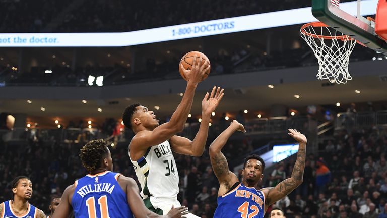 Giannis Antetokounmpo #34 of the Milwaukee Bucks drives to the basket against Lance Thomas #42 of the New York Knicks during the first half of a game at the Fiserv Forum on October 22, 2018 in Milwaukee, Wisconsin.