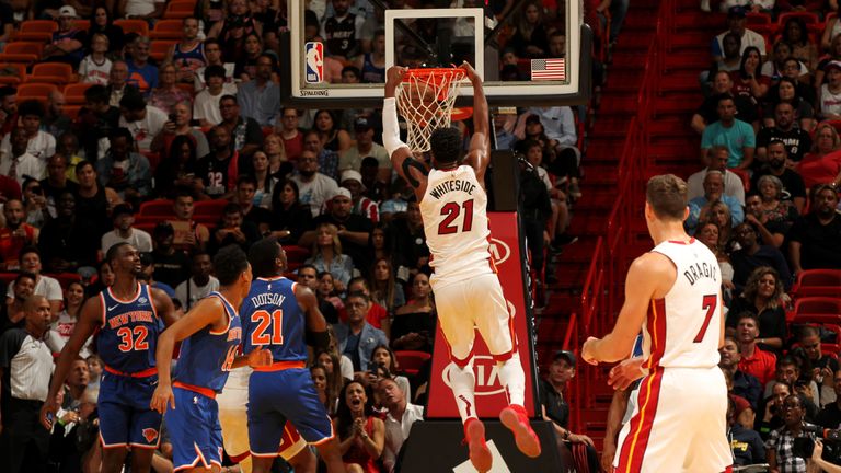 Hassan Whiteside #21 of the Miami Heat dunks the ball against the New York Knicks on October 24, 2018 at American Airlines Arena in Miami, Florida.