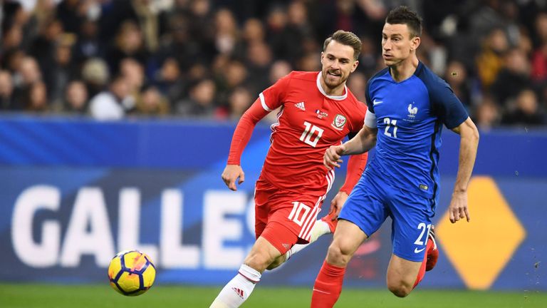Laurent Koscielny (r) of France and Aaron Ramsey of Wales during their friendly at Stade de France
