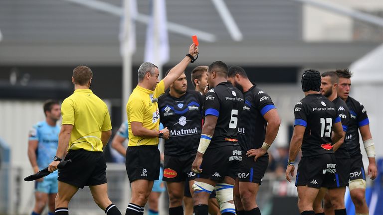 Ma'ama Vaipulu of Castres is shown a red card for a high tackle