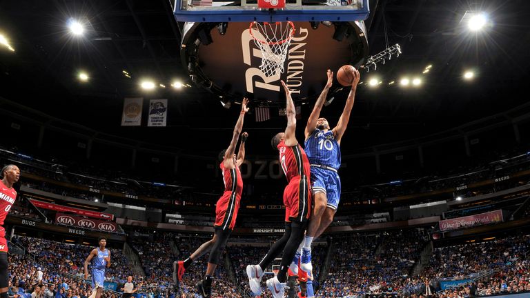 Evan Fournier #10 of the Orlando Magic goes to the basket against the Miami Heat on October 17, 2018 at Amway Center in Orlando, Florida.