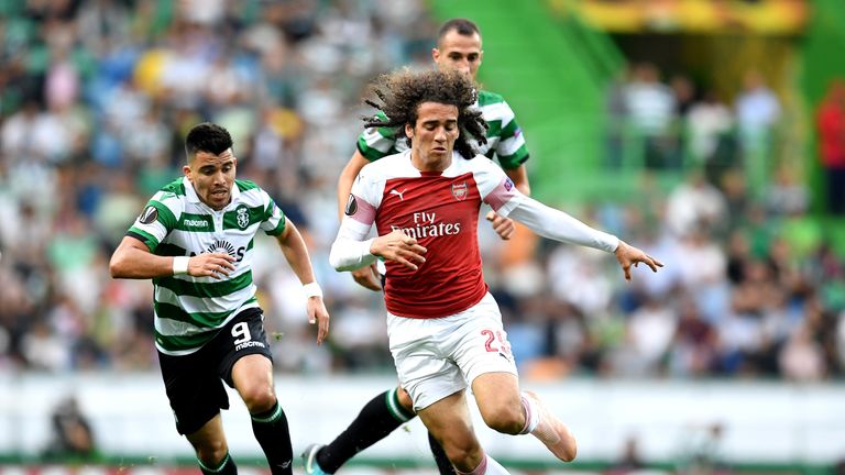 Marcos Acuna of Sporting CP chases Matteo Guendouzi of Arsenal during the UEFA Europa League Group E match