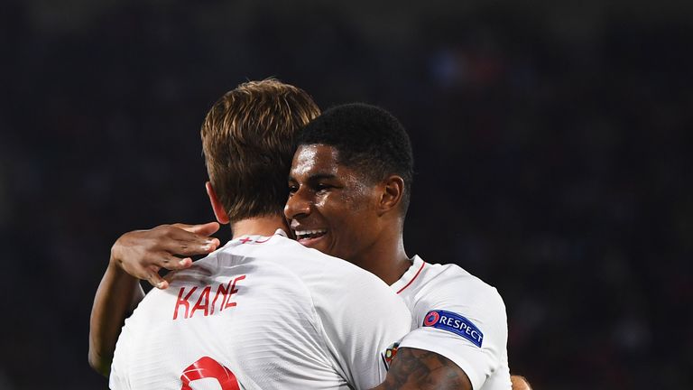 Marcus Rashford celebrates his goal with Harry Kane