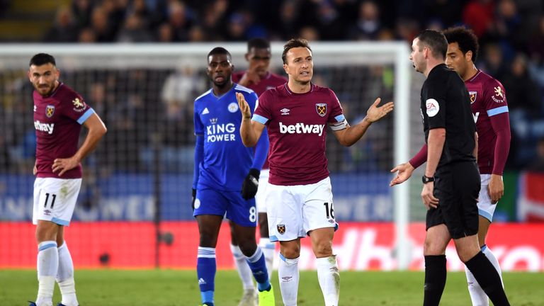 West Ham's Mark Noble reacts as referee Michael Oliver shows him a red card