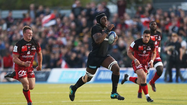 Maro Itoje breaks away for a try against Lyon at Allianz Park